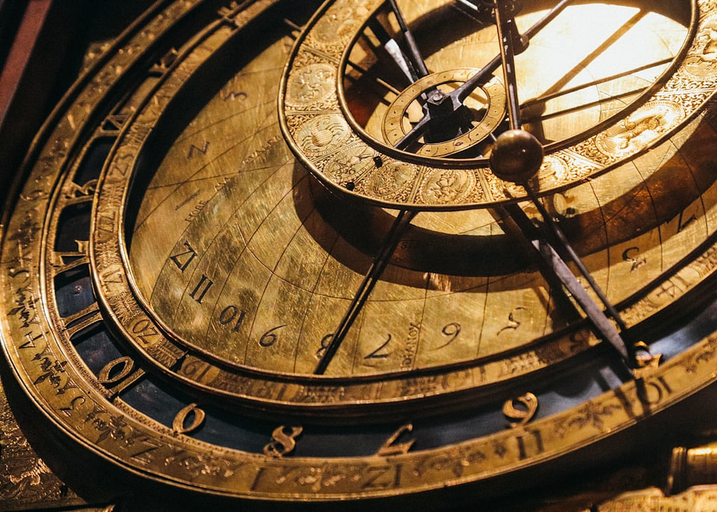 a close up of a clock with roman numerals
